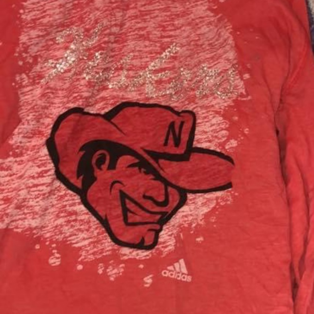 Long sleeve, hooded Nebraska Huskers shirt.